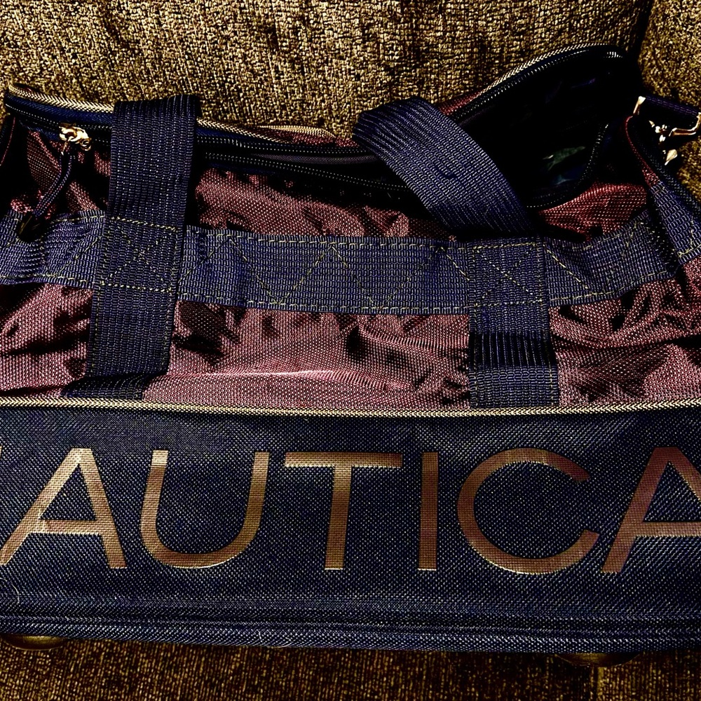 Nautica Duffel Bag 22” Navy, Burgundy& gray interior.